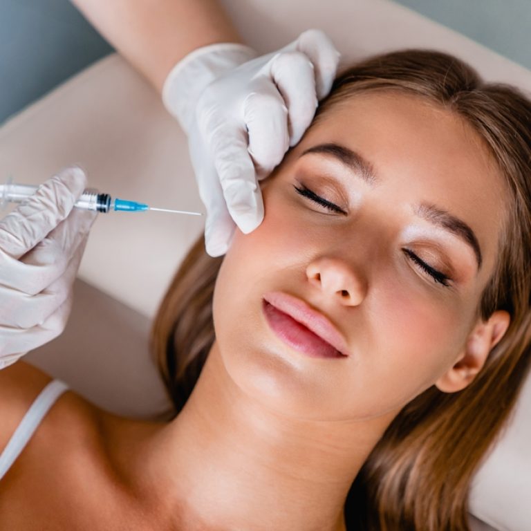 Young,Woman,Gets,Beauty,Facial,Injections,In,Salon.,Treatment,,Facial